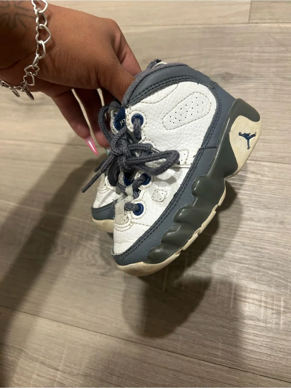 Jordan Kids White and Gray Retro Sneaker with Blue Eyelets
